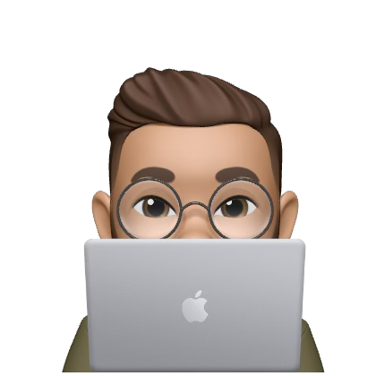 Person peeking from behind a laptop